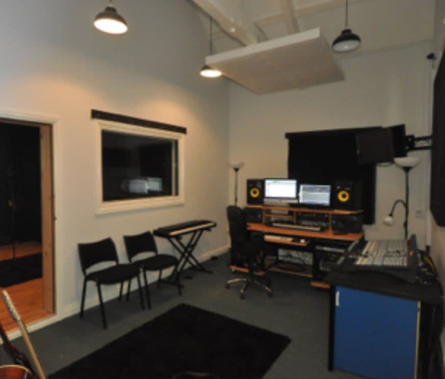 Keswick School studio control room with the window through to the live room