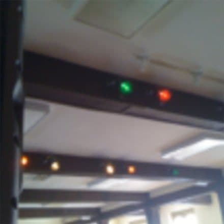 Lights on a ceiling beam in the hall