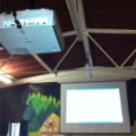 Projector and pull-down screen in the hall