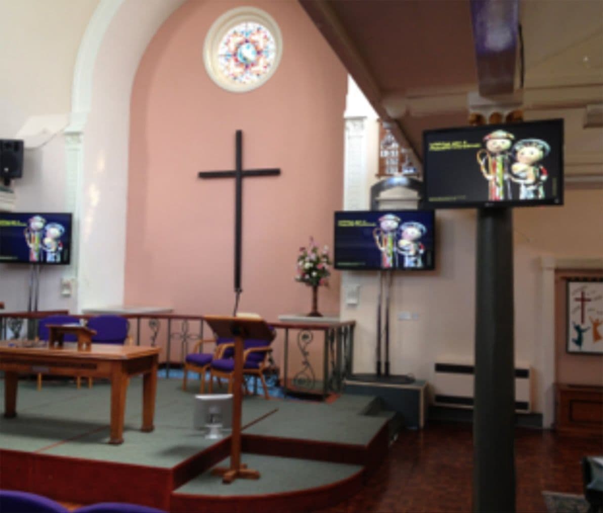 South Street Baptist Church: screens on stands either side of the platform