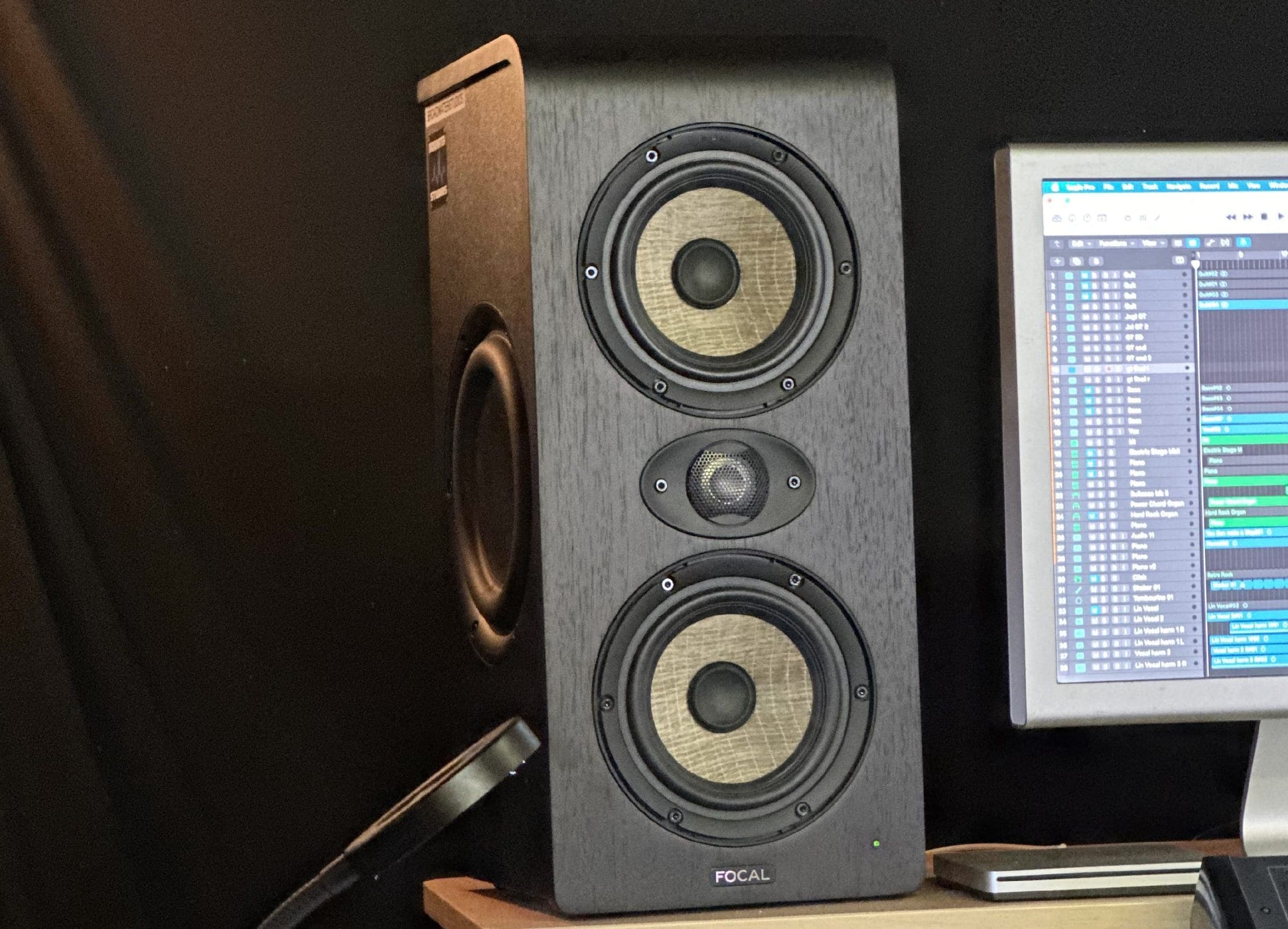 Focal studio monitor beside the session screen