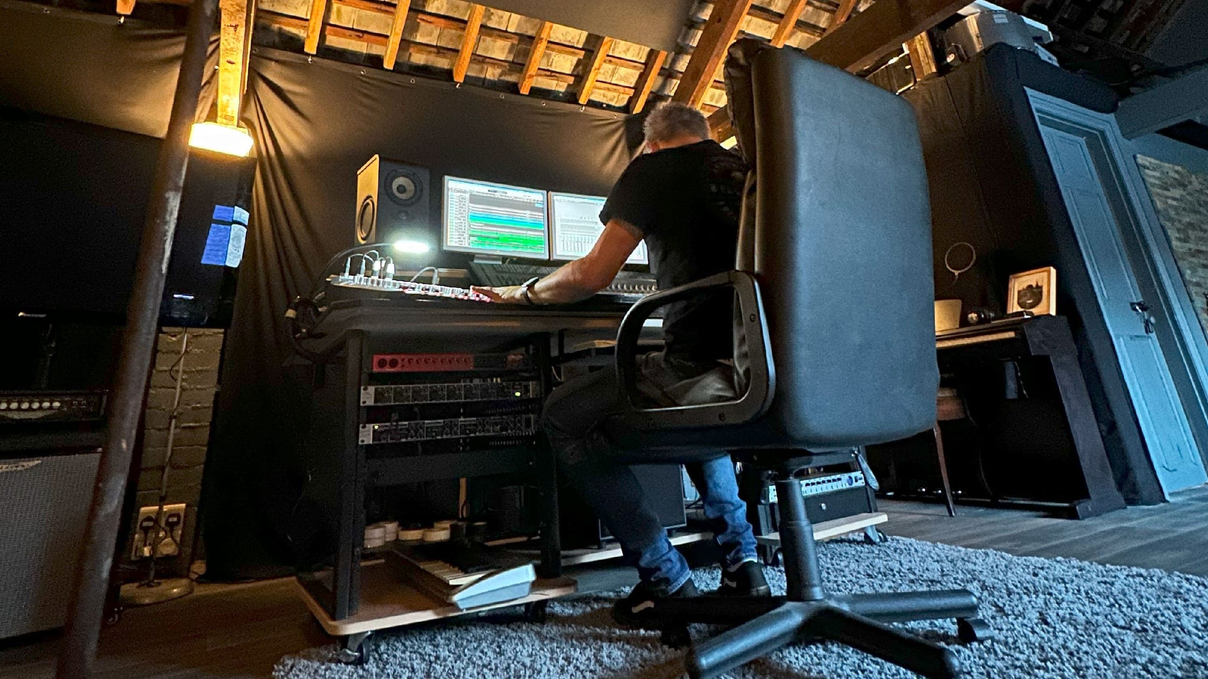 Producer working at the mixing desk