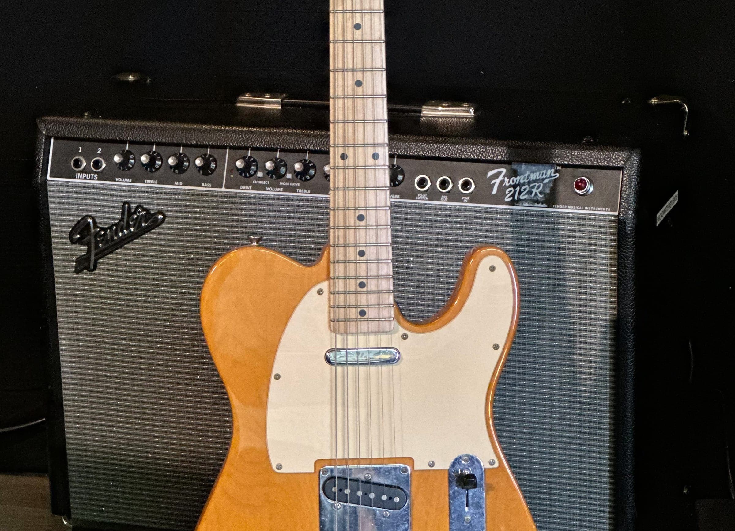 Fender Telecaster in front of a Fender amplifier